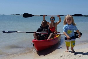 My family's triumphant return to shore after our kayaking expedition (March, 2016)