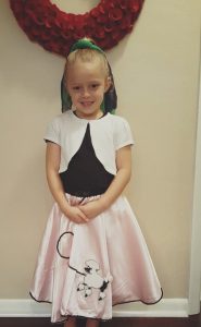 Viviana, age 6, dressed up in '50's attire (May, 2016)